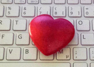 Herz auf Computer-Tastatur
